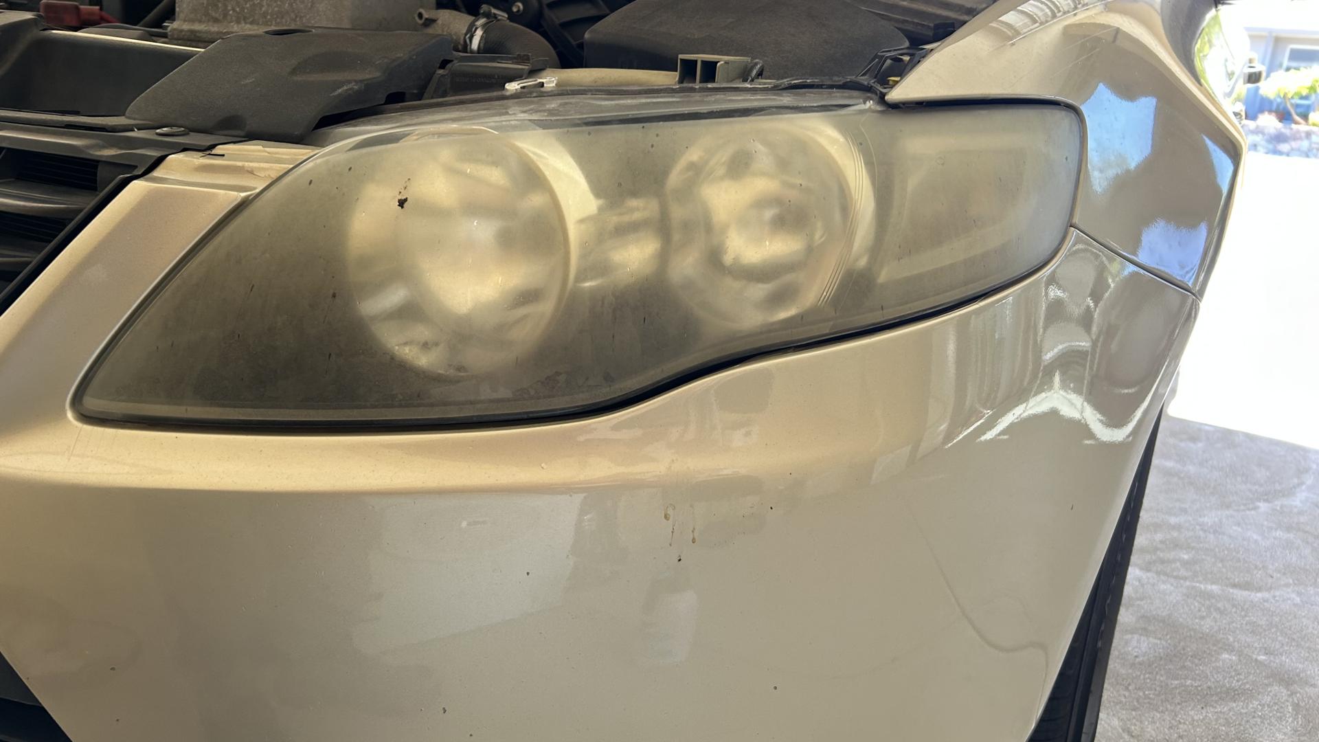 Before and after headlight restoration in Applecross