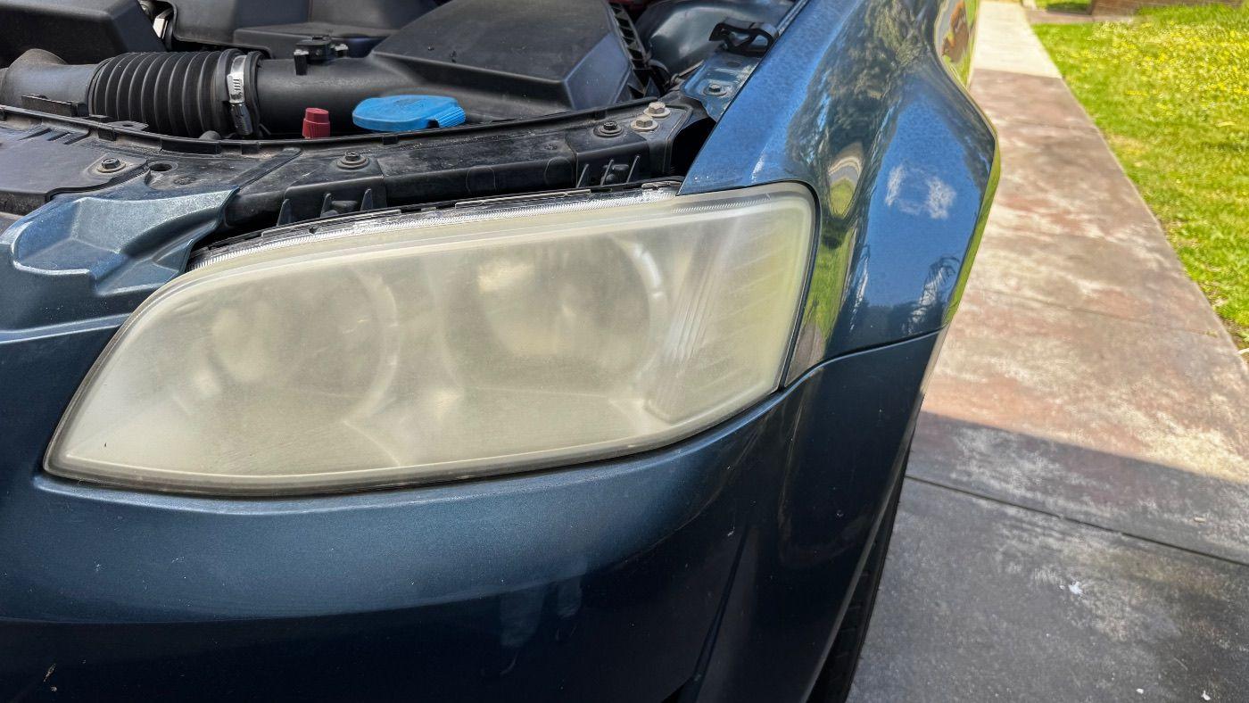 Yellowed, cloudy Holden Commodore headlight before restoration