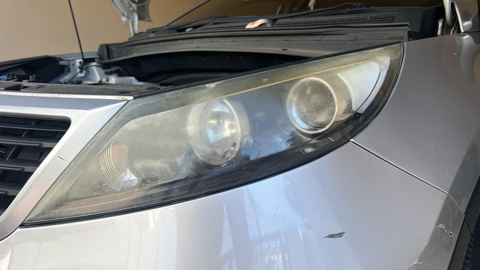 Before and after headlight restoration on a work ute, Wangara